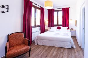 Ein Bett oder Betten in einem Zimmer der Unterkunft Hotel Spa Salinas de Imón