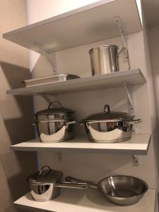Η κουζίνα ή μικρή κουζίνα στο Asuncion Gracia Suites