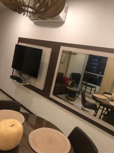 Μια τηλεόραση ή/και κέντρο ψυχαγωγίας στο Asuncion Gracia Suites