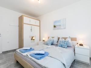 Posteľ alebo postele v izbe v ubytovaní 3 & 4 bedrooms apartment Simona