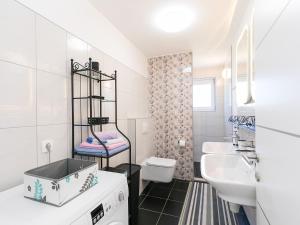 Kúpeľňa v ubytovaní 3 & 4 bedrooms apartment Simona