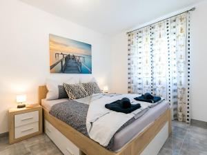Posteľ alebo postele v izbe v ubytovaní 3 & 4 bedrooms apartment Simona