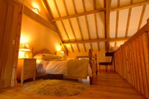 Katil atau katil-katil dalam bilik di Spangle Cottage, Borrowby Farm Cottages