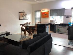 Kuchyň nebo kuchyňský kout v ubytování Home Suhaila