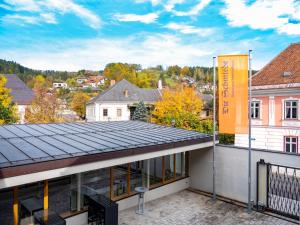 a view of a house with solar panels on the roof at Die Schmiede in Ybbsitz