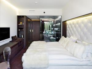 Voodi või voodid majutusasutuse Hotel Riverton toas