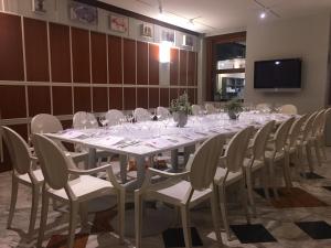 Ein Restaurant oder anderes Speiselokal in der Unterkunft Alli Due Buoi Rossi 