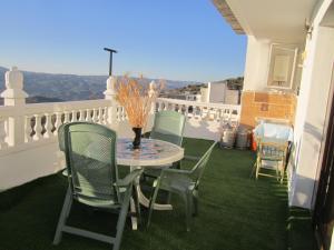 En balkon eller terrasse på Casa Mamica Rosario