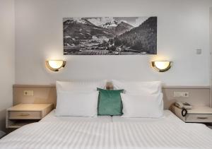 Postel nebo postele na pokoji v ubytování Hotel Goethehof