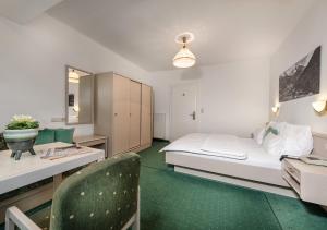 Postel nebo postele na pokoji v ubytování Hotel Goethehof