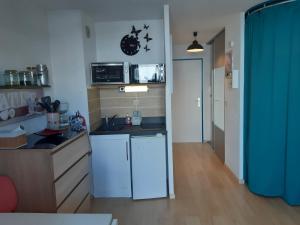 a kitchen with a sink and a counter top at MBS b6 in Manigod