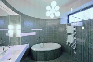 a bathroom with a bath tub and a sink at Hotel König von Ungarn in Vienna
