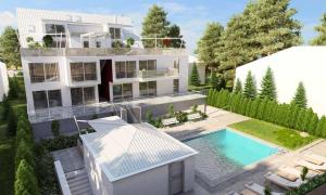 una vista aerea di una casa con piscina di Red Flower Apartment with Pool - 5 min to Lake a Vienna