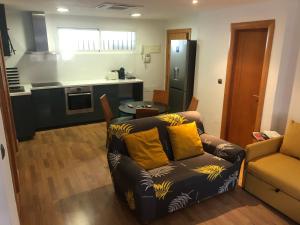 Kuchyň nebo kuchyňský kout v ubytování Ílios Soho Apartamentos