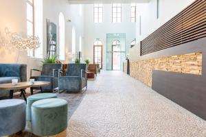 Posezení v ubytování Eburon Hotel