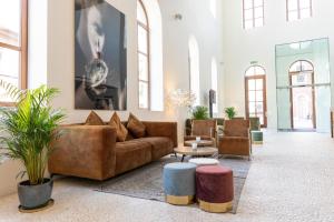 Posezení v ubytování Eburon Hotel