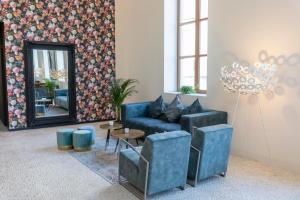Posezení v ubytování Eburon Hotel