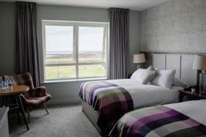 Postel nebo postele na pokoji v ubytování Armada Hotel