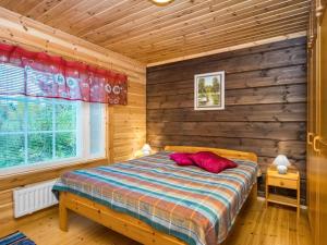 Katil atau katil-katil dalam bilik di Holiday Home Lassinmaja by Interhome