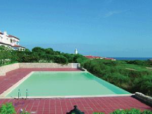 a large swimming pool on top of a building at Holiday Home Praia del Rey Golf Casa by Interhome in Casal da Lagoa Seca