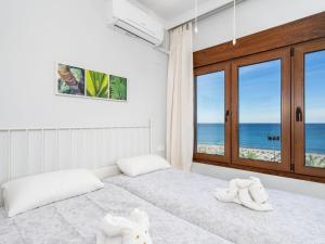 Cama o camas de una habitación en Apartment Apartamento Perla Del Sol