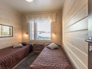 Postel nebo postele na pokoji v ubytování Holiday Home Hil-lak-ka ii as 7 by Interhome + 8 fotografií