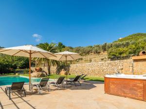 The swimming pool at or close to Villa Santa Llucia by Interhome