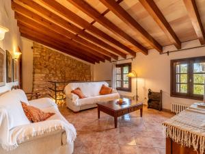 A seating area at Villa Santa Llucia by Interhome