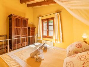 A bed or beds in a room at Villa Santa Llucia by Interhome