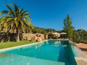 The swimming pool at or close to Villa Santa Llucia by Interhome