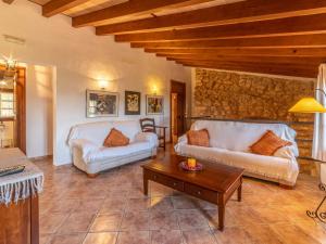 A seating area at Villa Santa Llucia by Interhome