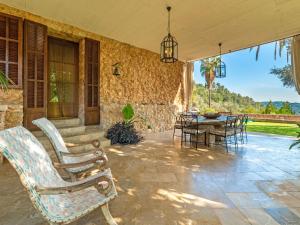 The swimming pool at or close to Villa Santa Llucia by Interhome