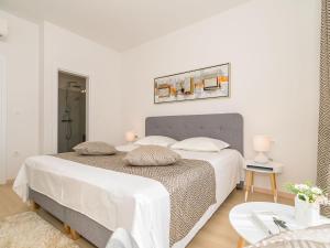 Postel nebo postele na pokoji v ubytování Holiday Home Villa Meri 2 by Interhome