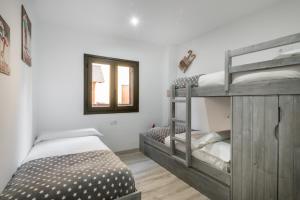 A bed or beds in a room at Adriana by Totiaran