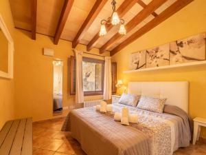 A bed or beds in a room at Villa Santa Llucia by Interhome