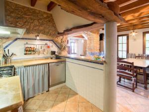A kitchen or kitchenette at Villa Santa Llucia by Interhome