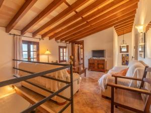 A television and/or entertainment centre at Villa Santa Llucia by Interhome