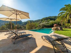 The swimming pool at or close to Villa Santa Llucia by Interhome