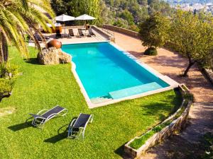 The swimming pool at or close to Villa Santa Llucia by Interhome