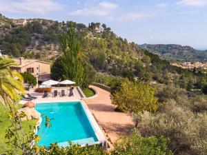 The swimming pool at or close to Villa Santa Llucia by Interhome