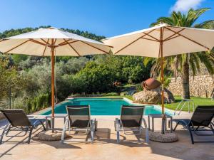 The swimming pool at or close to Villa Santa Llucia by Interhome