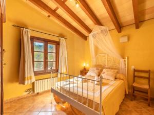 A bed or beds in a room at Villa Santa Llucia by Interhome
