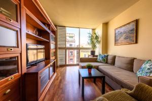 Posedenie v ubytovaní RamblasRentals Stylish Bright 3BR New Catalan Flat 10m Ramblas - Parking - Wifi