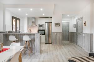 A kitchen or kitchenette at Adriana by Totiaran
