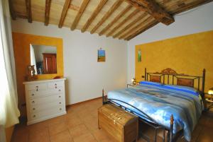 Posteľ alebo postele v izbe v ubytovaní Agriturismo la Nicchia