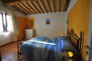 Posteľ alebo postele v izbe v ubytovaní Agriturismo la Nicchia