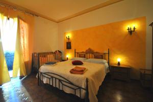 Posteľ alebo postele v izbe v ubytovaní Agriturismo la Nicchia