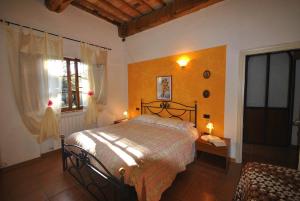 Posteľ alebo postele v izbe v ubytovaní Agriturismo la Nicchia