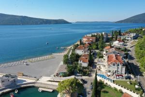 a town on the shore of a body of water at Boutique Hotel Kredo in Herceg-Novi