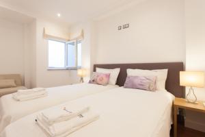 Кровать или кровати в номере Sao Bento Luxus with Terrace